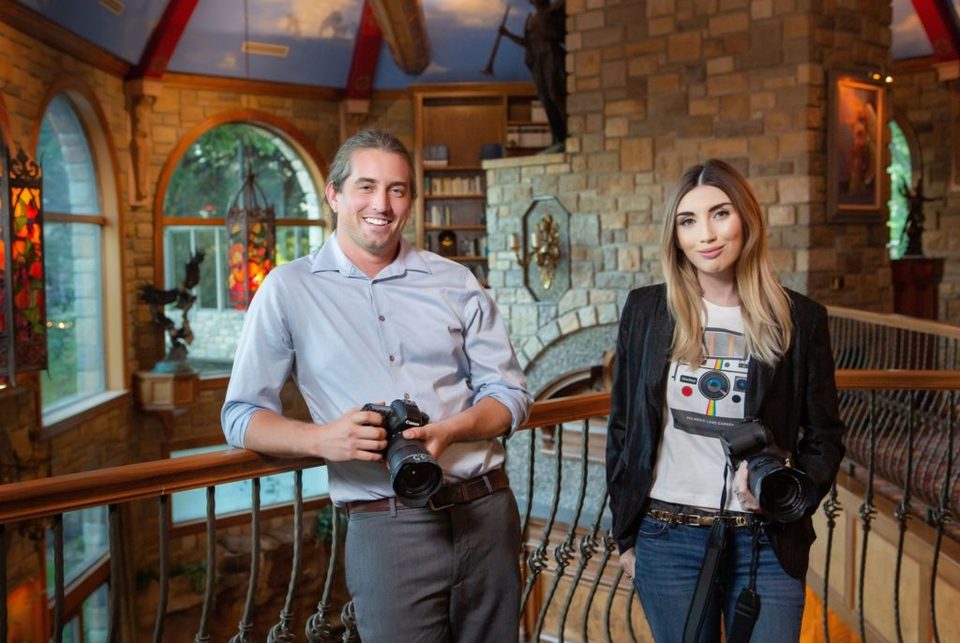 Christopher and Jennifer Johnson, owners of The Perfect Spot For You, with their cameras