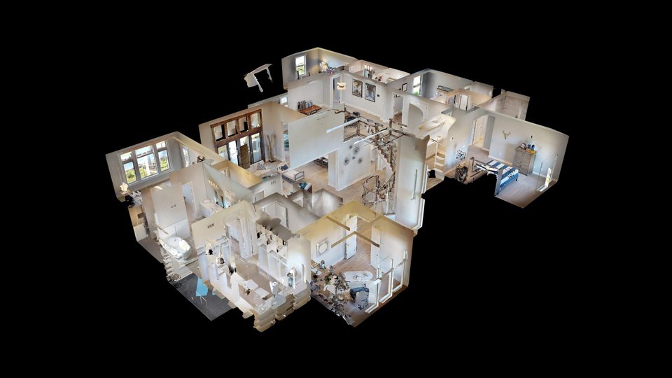 A Matterport dollhouse view of a home